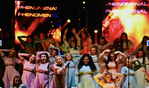 the girls are working it on stage